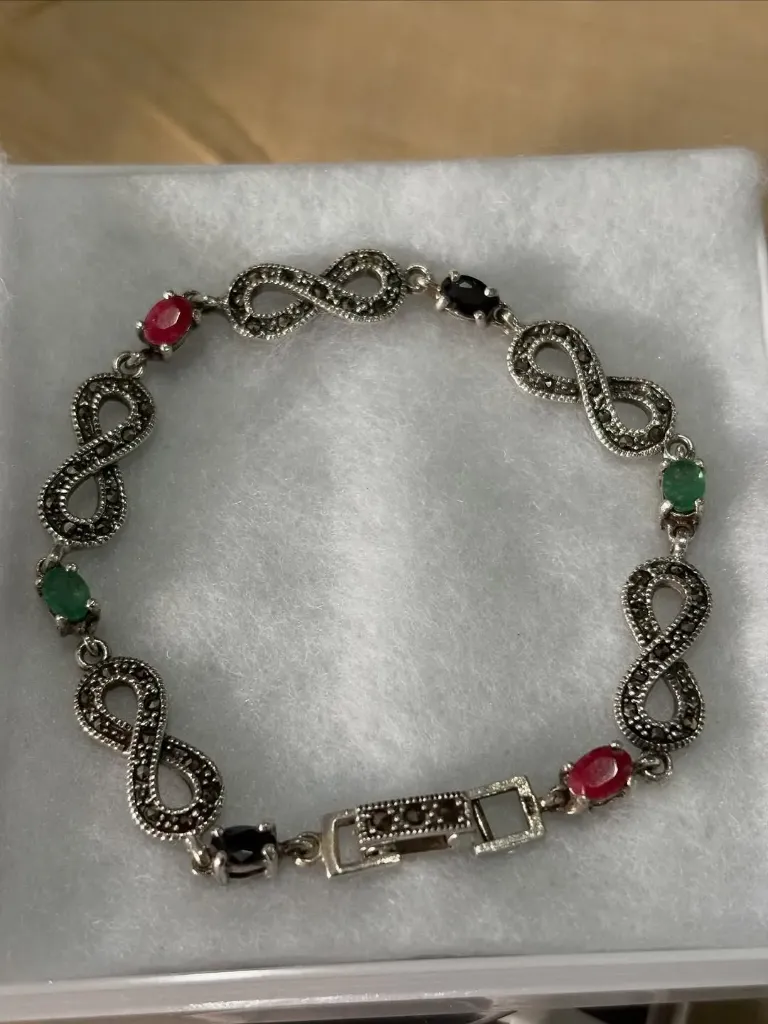 Infinity style links, red/green/black stones